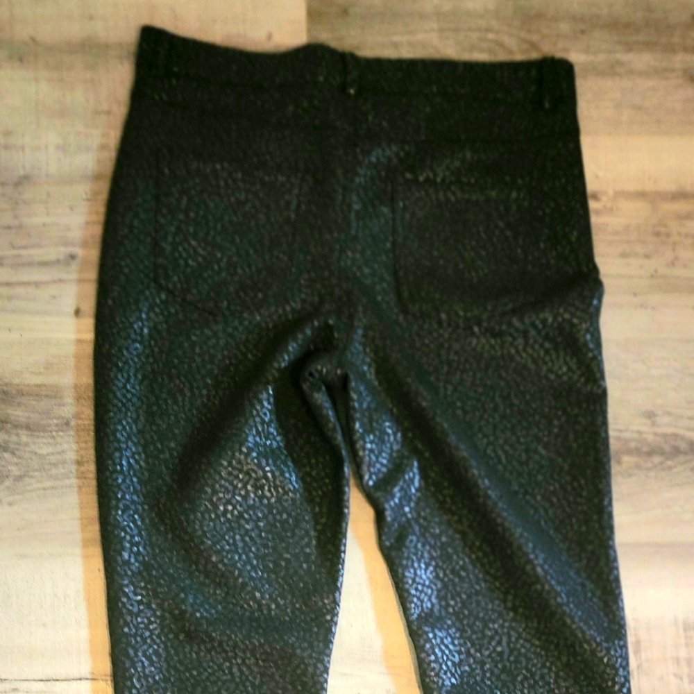 Womens Black suede-like, stretch fabric pants.
